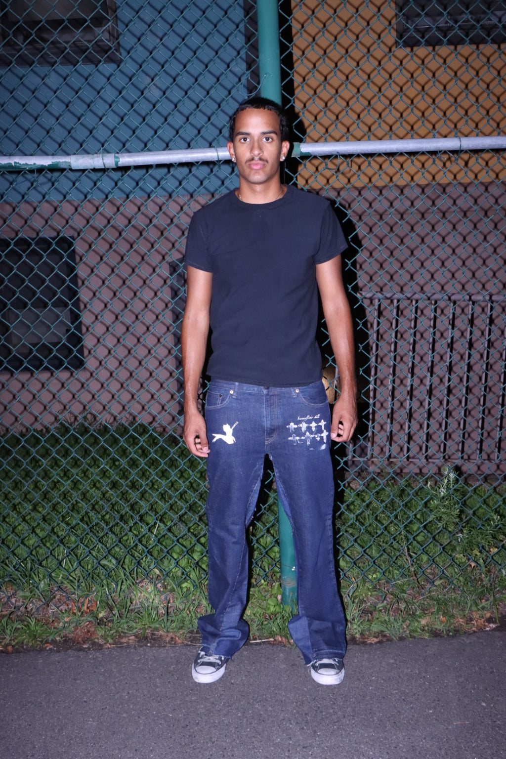 “crossed” jeans